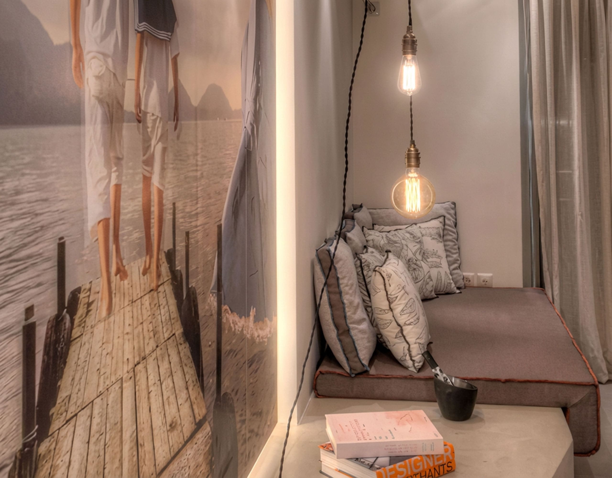 Suite seating nook with pendant light and textured wall, Pasalimani (Zea Marina), Piraeus, Greece