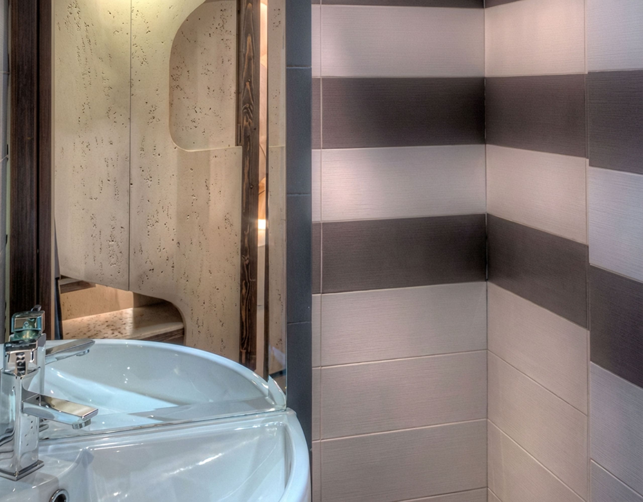 Bathroom detail with round basin sink and striped wall tiles, Pasalimani (Zea Marina), Piraeus, Greece