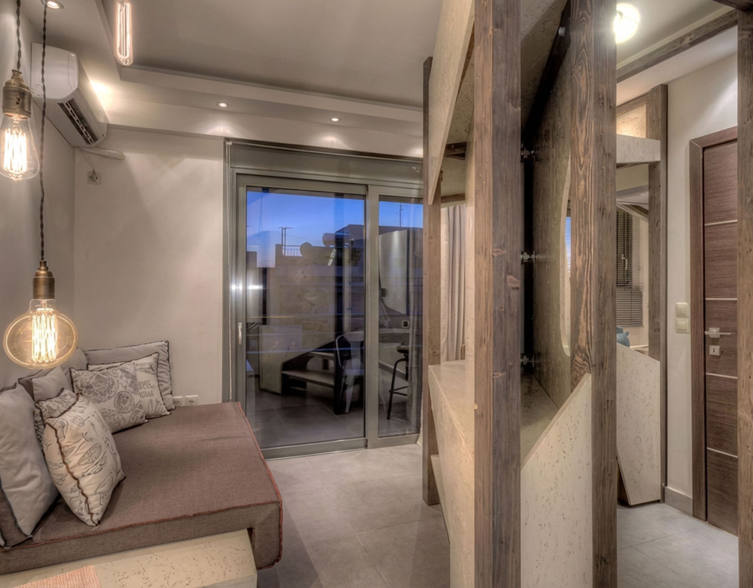 Suite corridor with seating and warm ambient lighting, Pasalimani (Zea Marina), Piraeus, Greece