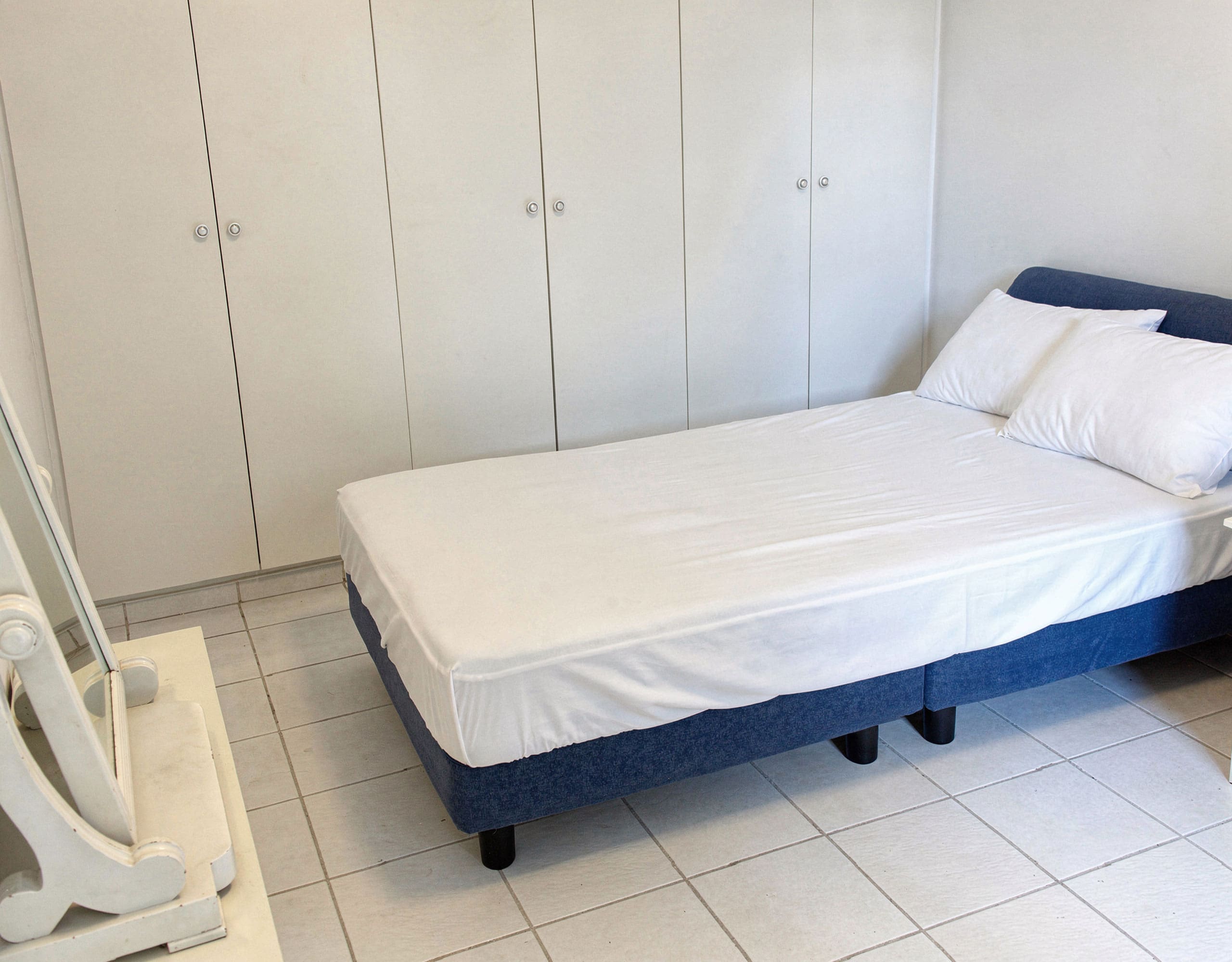 Voula Duplex 181 sqm – Bedroom With Tiled Floor Bedroom with single bed and tiled floor, Voula, Athens Riviera, Greece