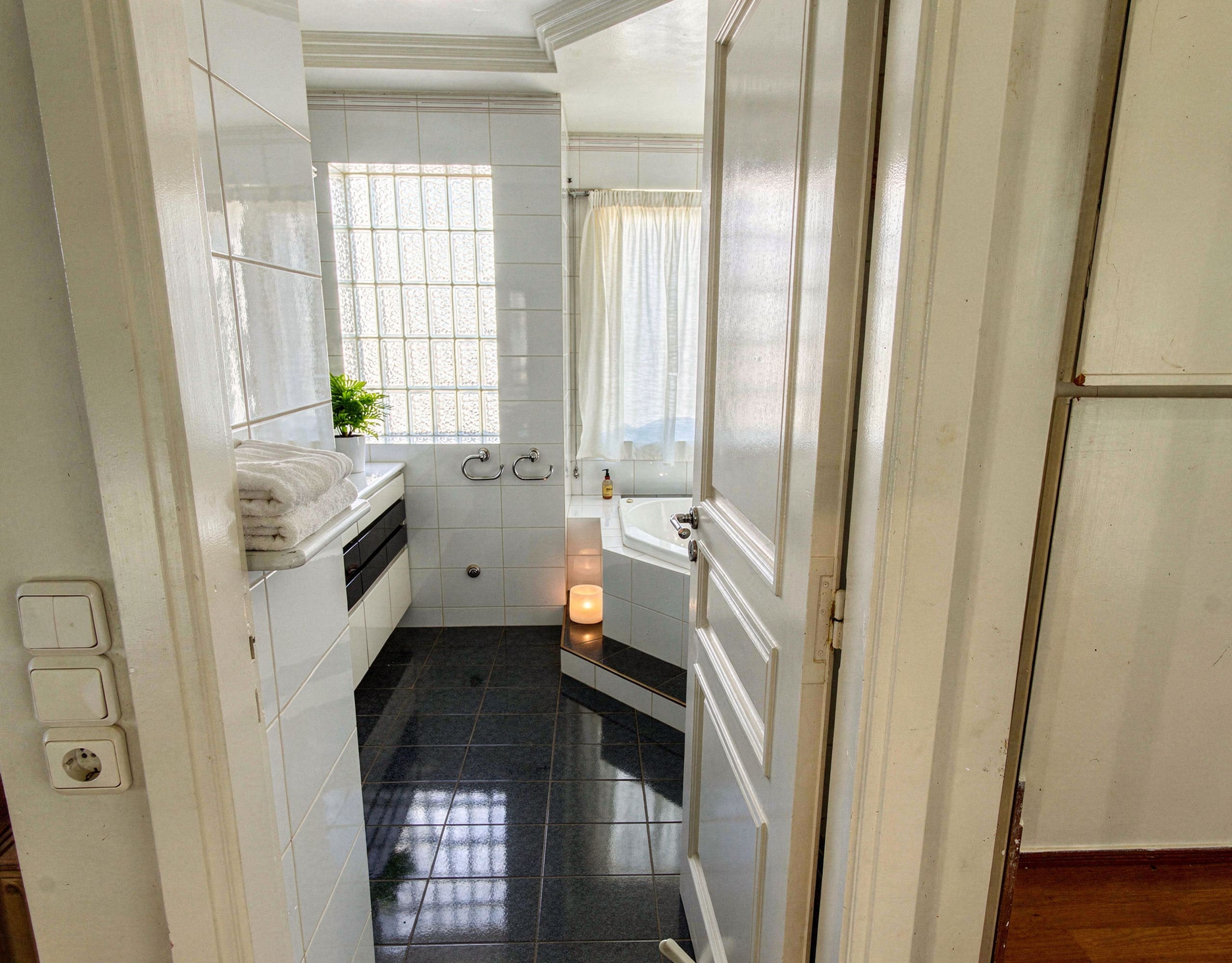 Voula Duplex 181 sqm – Bathroom View From The Doorway Bathroom view from the doorway with tiled floor and shower area, Voula, Athens Riviera, Greece