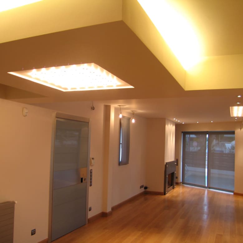 Upper-level hallway with recessed lighting at a private villa in Alimos, Athens Riviera