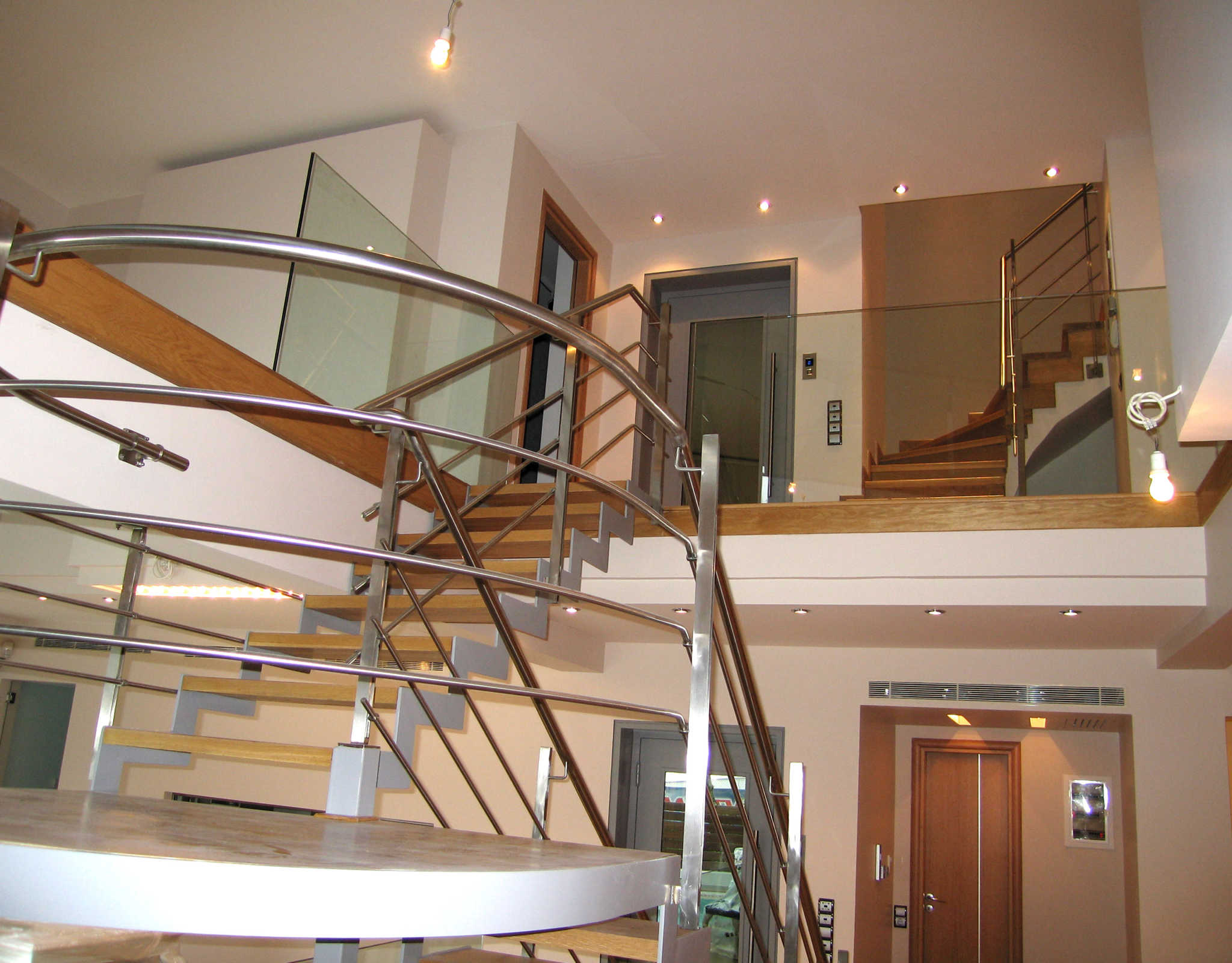 Staircase landing and upper corridor at a private villa in Alimos, Athens Riviera