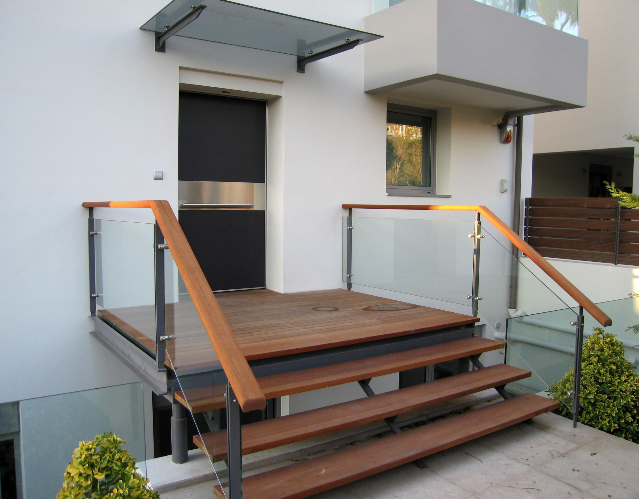 Private villa entrance with steps and modern façade in Alimos, Athens Riviera