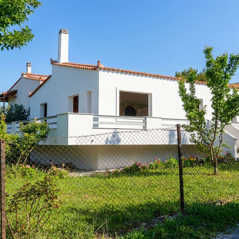Detached house exterior with garden area and surrounding greenery, Dilesi, Boeotia, Greece