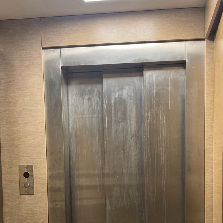 Private elevator interior with metallic doors and control panel, Porto Rafti, Greece