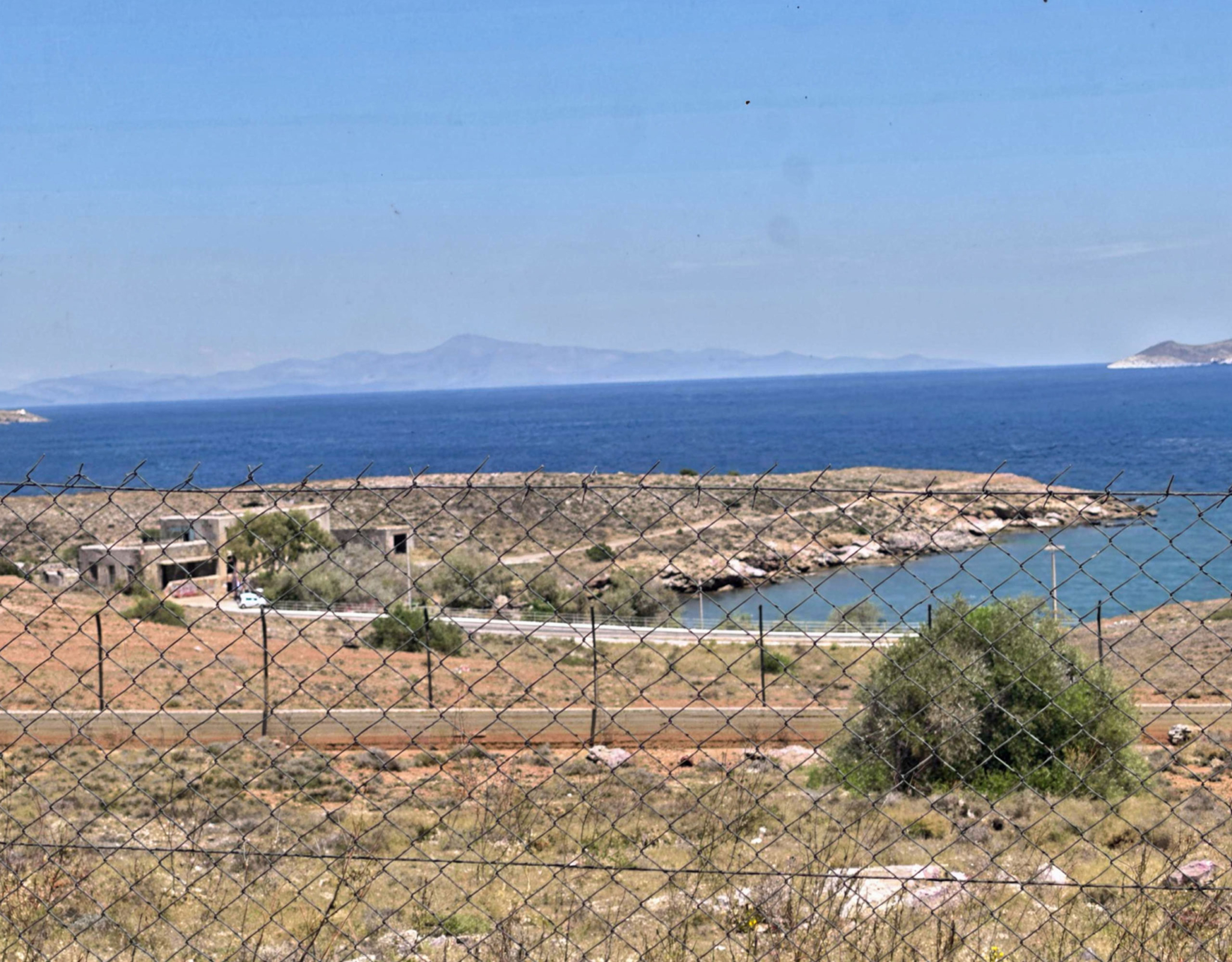 Panoramic view of the coastline and sea from the land plot, Greece