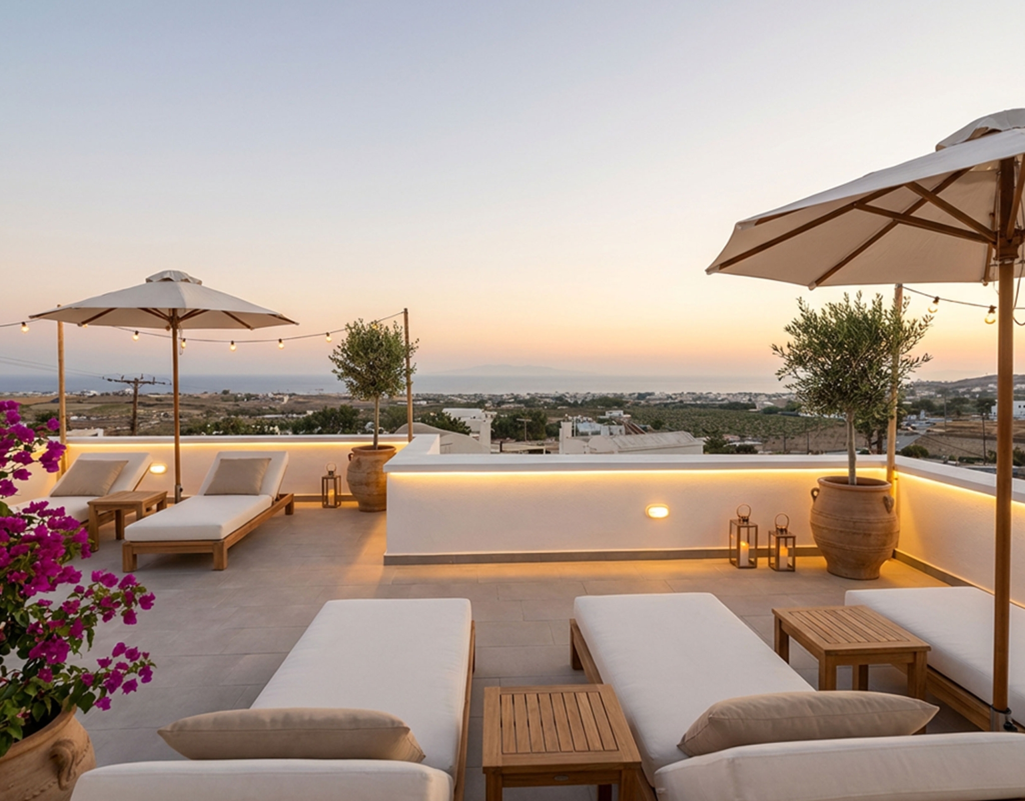 Sea-view terrace at sunset at the Exo Gonia apartment, Santorini