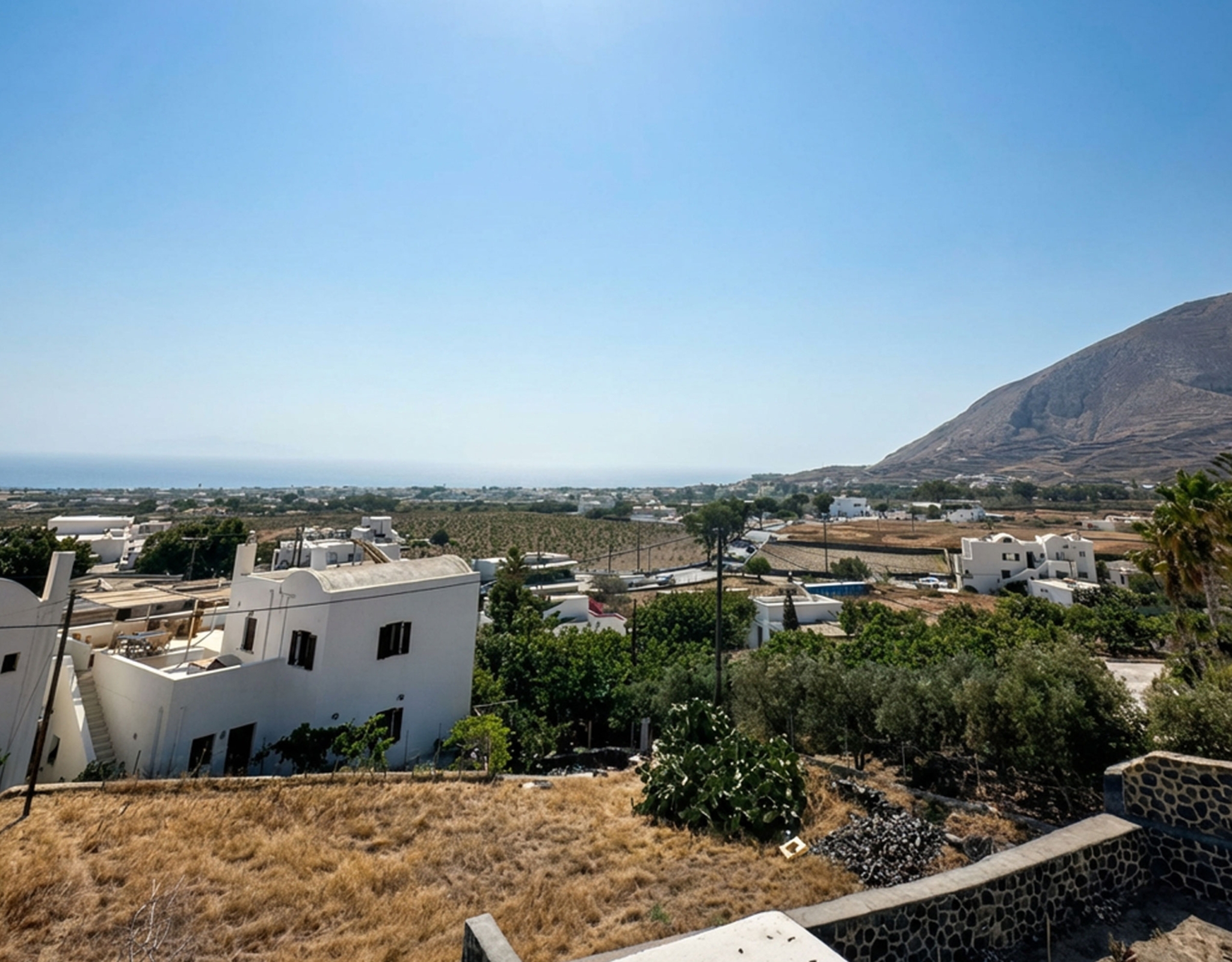 Landscape and village view near Exo Gonia, Santorini from the apartment area