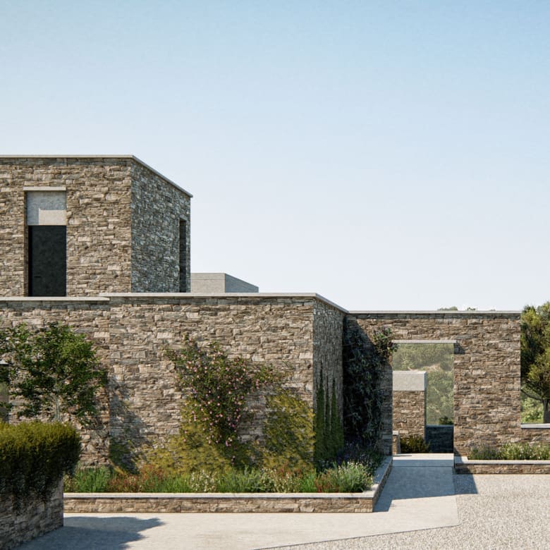 Stone exterior volumes of The Pebble House villa in Tinos, Cyclades