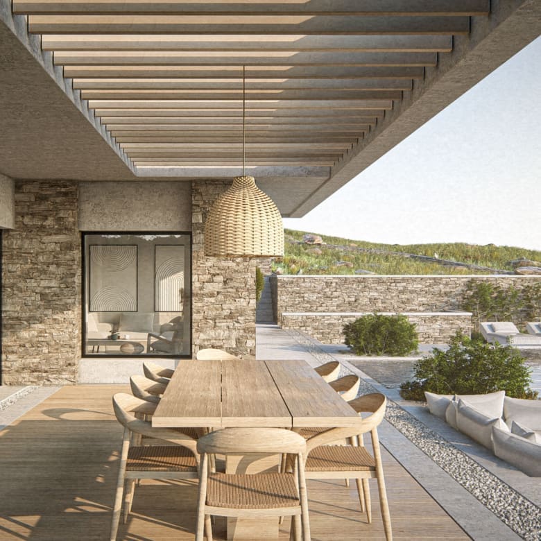 Outdoor dining terrace with pergola and sea view at The Pebble House, Tinos, Cyclades
