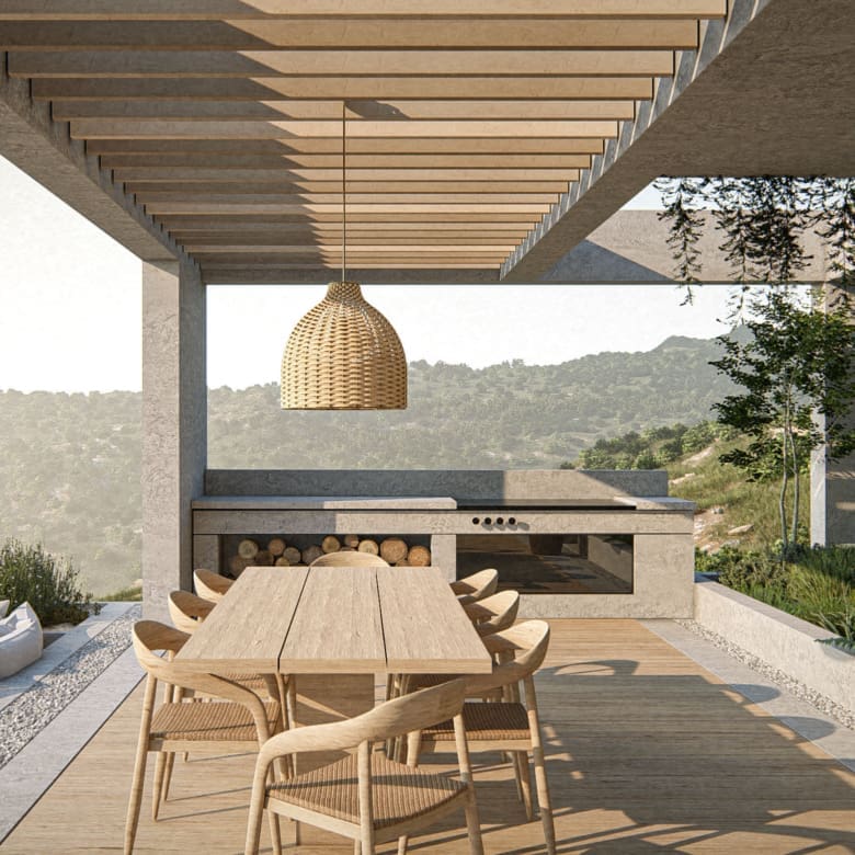 Covered outdoor dining area with built-in BBQ at The Pebble House, Tinos, Cyclades