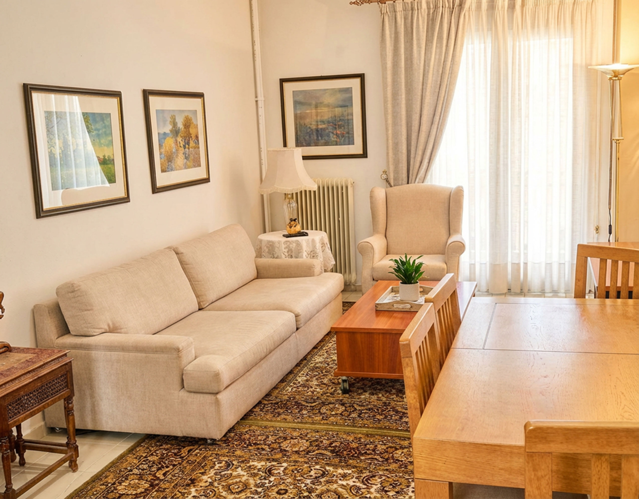 Living room with sofa, coffee table, and balcony door, Athens City Center, Greece