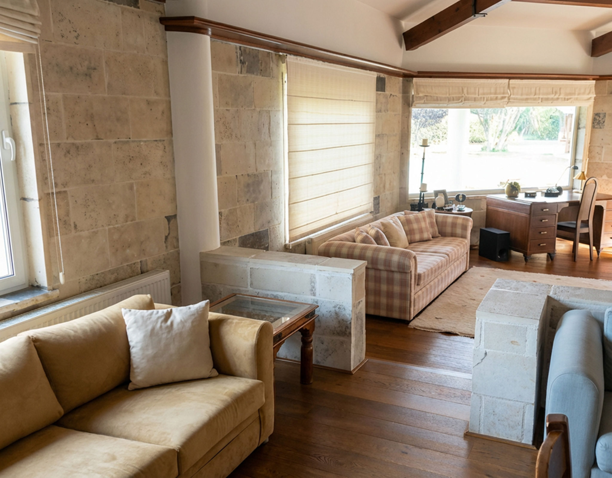 Porto Rafti Estate – Living Area with Stone Finishes Living area with stone finishes and natural light at a private estate in Porto Rafti, Attica