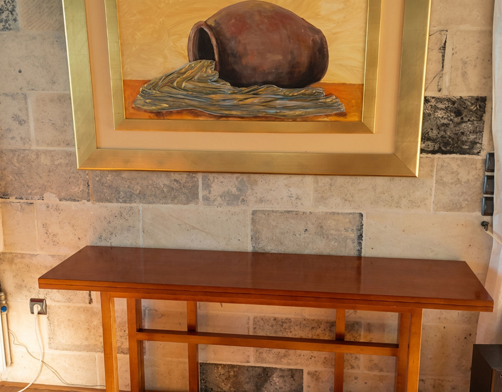 Porto Rafti Estate – Console Table & Artwork Wood console table with framed artwork in the Porto Rafti private estate interior