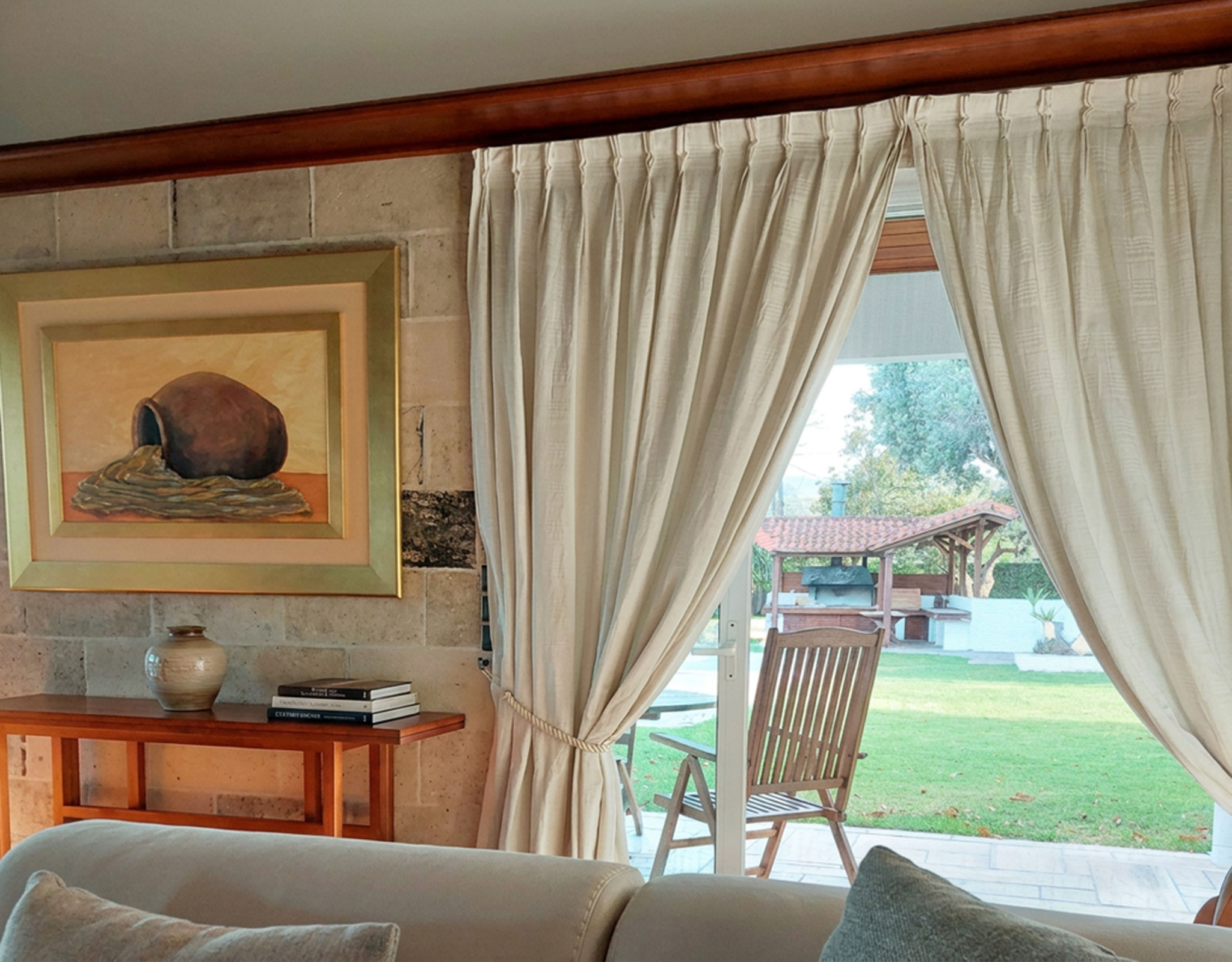 Porto Rafti Estate – Window View to the Garden Interior window with curtains and garden outlook at the Porto Rafti private estate
