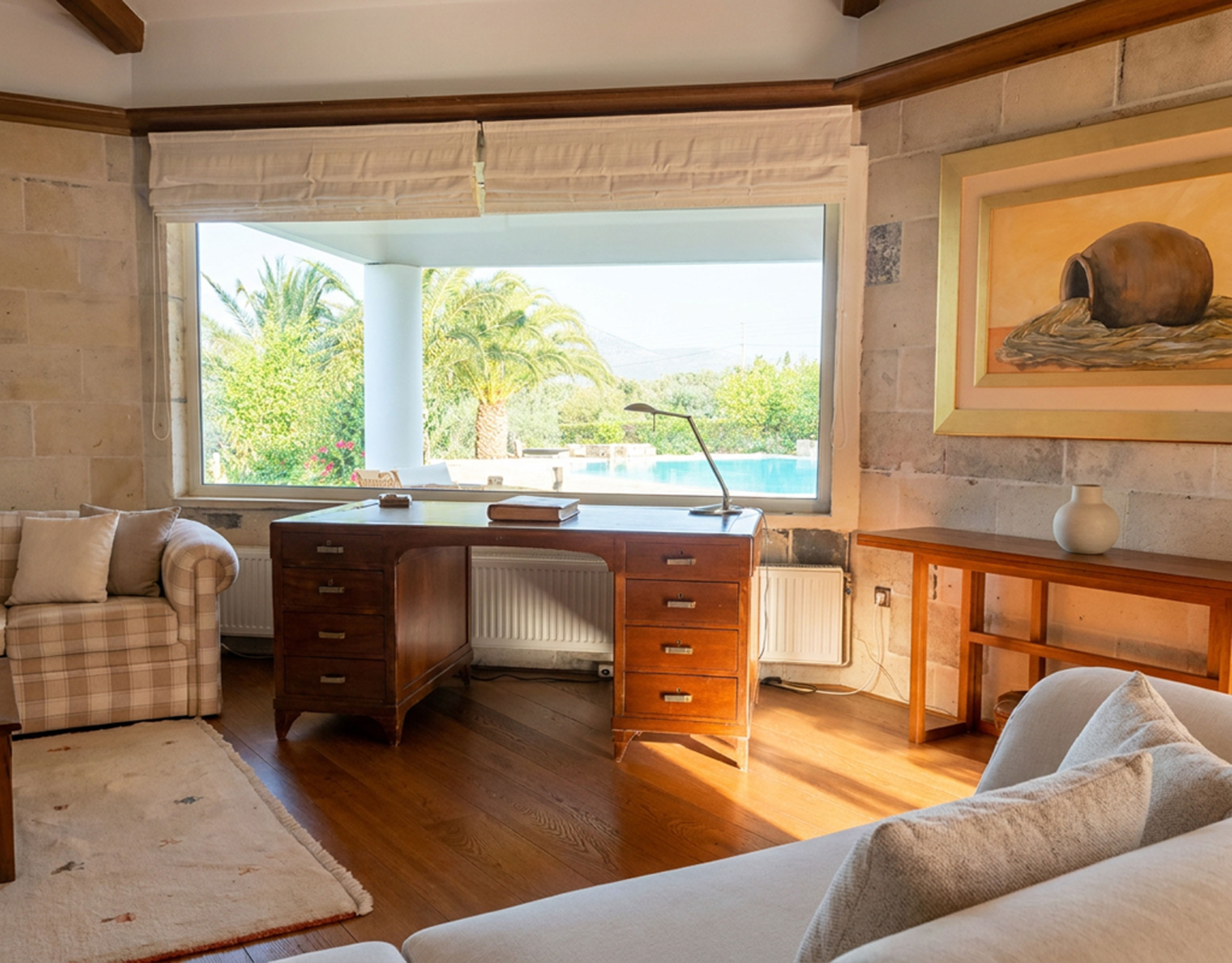 Porto Rafti Estate – Living Room with Garden View Living room with seating and garden view at a private estate in Porto Rafti, Attica