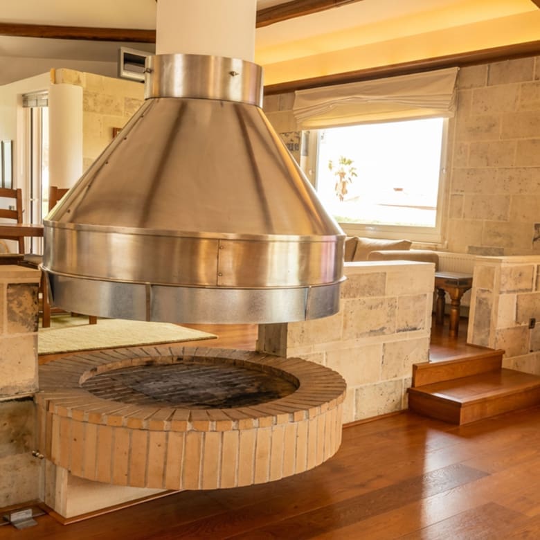 Statement fireplace feature in the Porto Rafti private estate interior