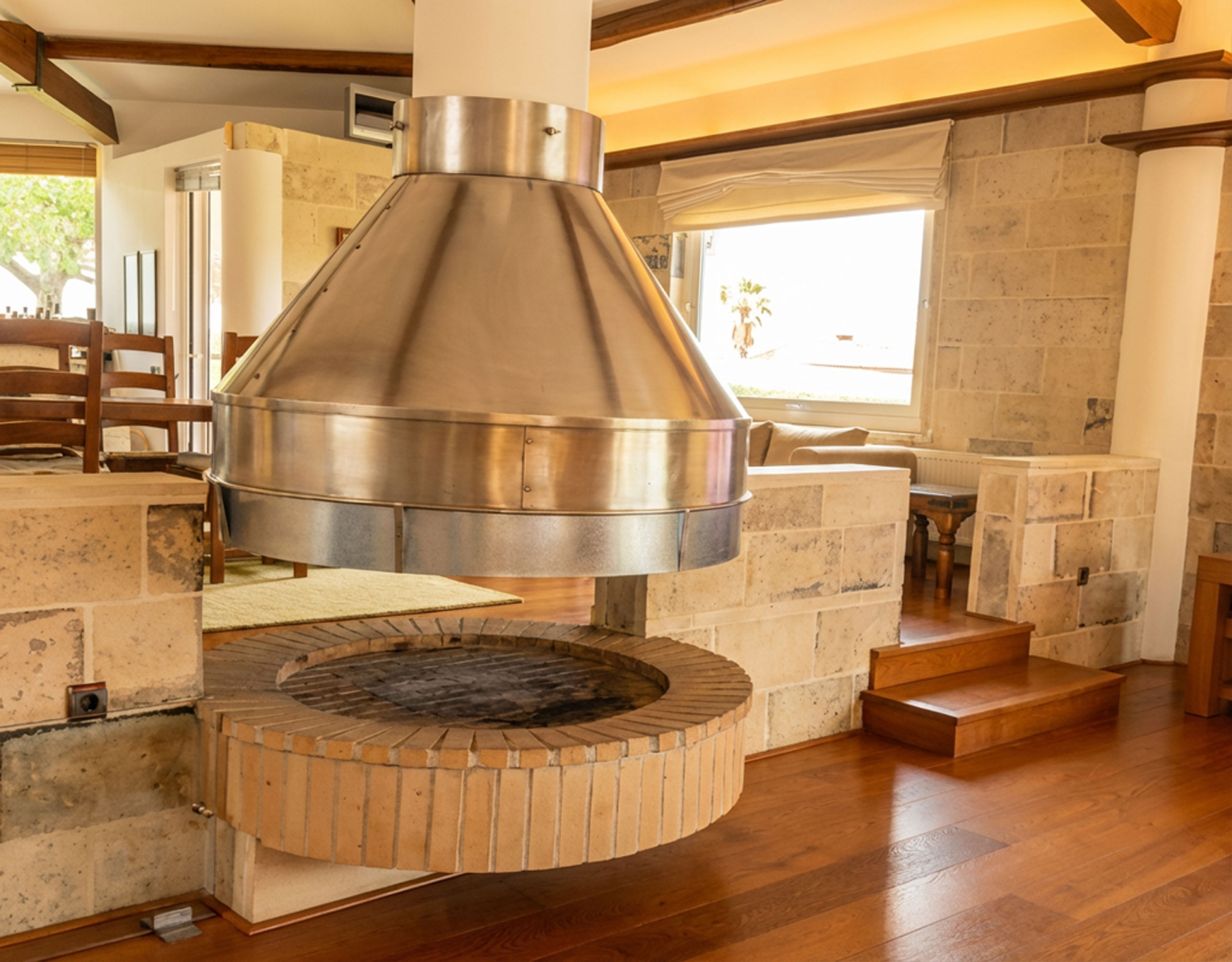 Porto Rafti Estate – Statement Fireplace Feature Statement fireplace feature in the Porto Rafti private estate interior