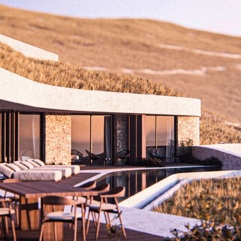 Outdoor dining terrace with sea view at Strokes of Tinos luxury cave villas, Tinos, Cyclades