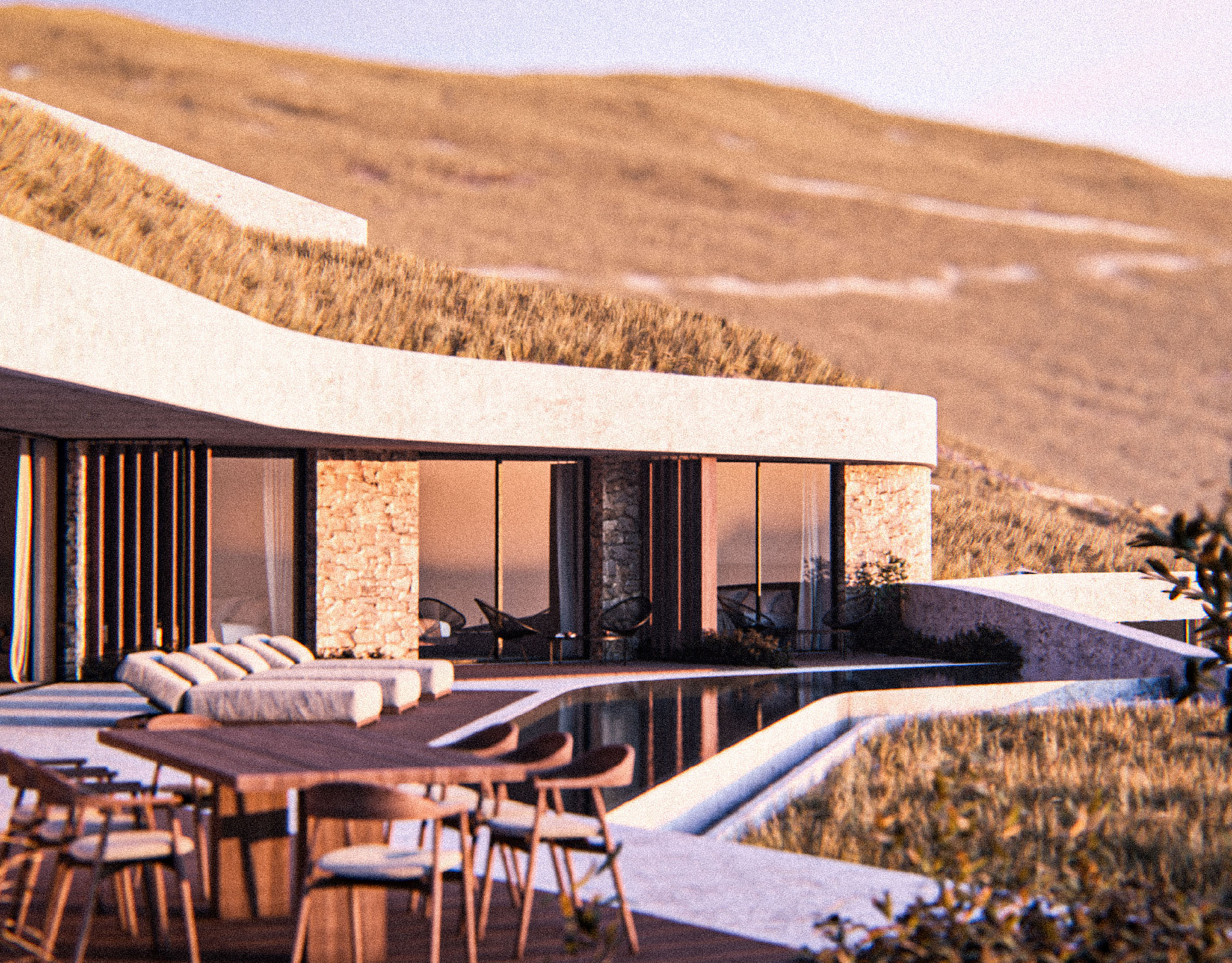 Outdoor dining terrace with sea view at Strokes of Tinos luxury cave villas, Tinos, Cyclades