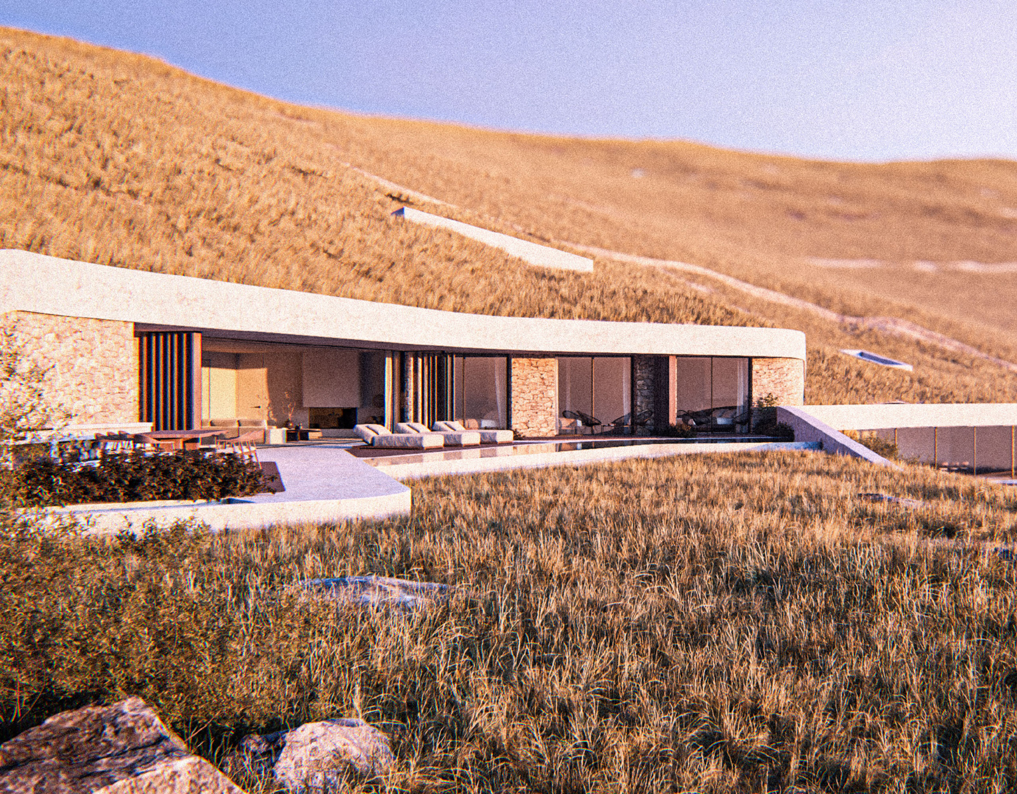 Exterior view of Strokes of Tinos cave villas integrated into the landscape, Tinos, Cyclades