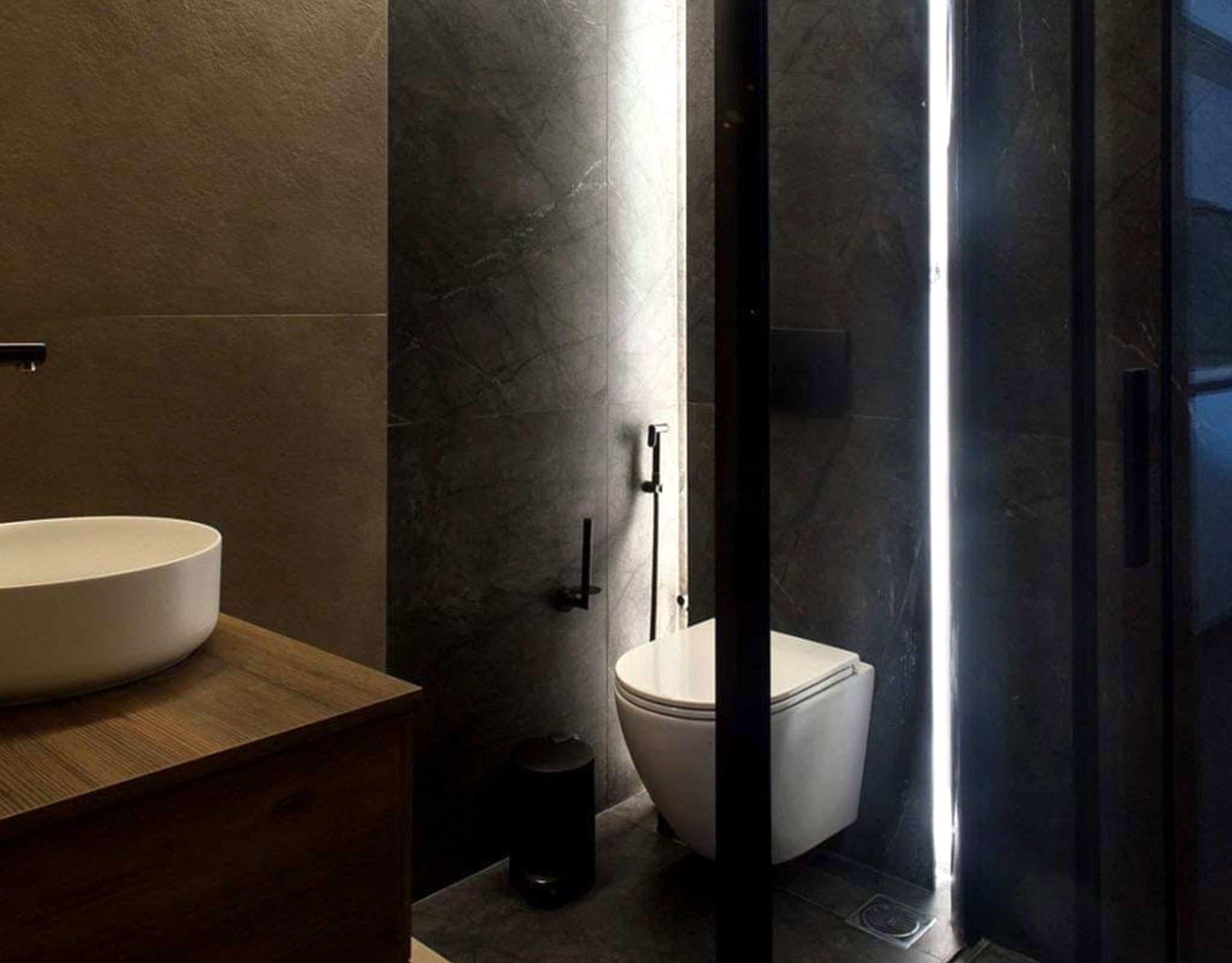 Bathroom with dark finishes, toilet, and walk-in shower enclosure, Nea Filothei, Athens, Greece