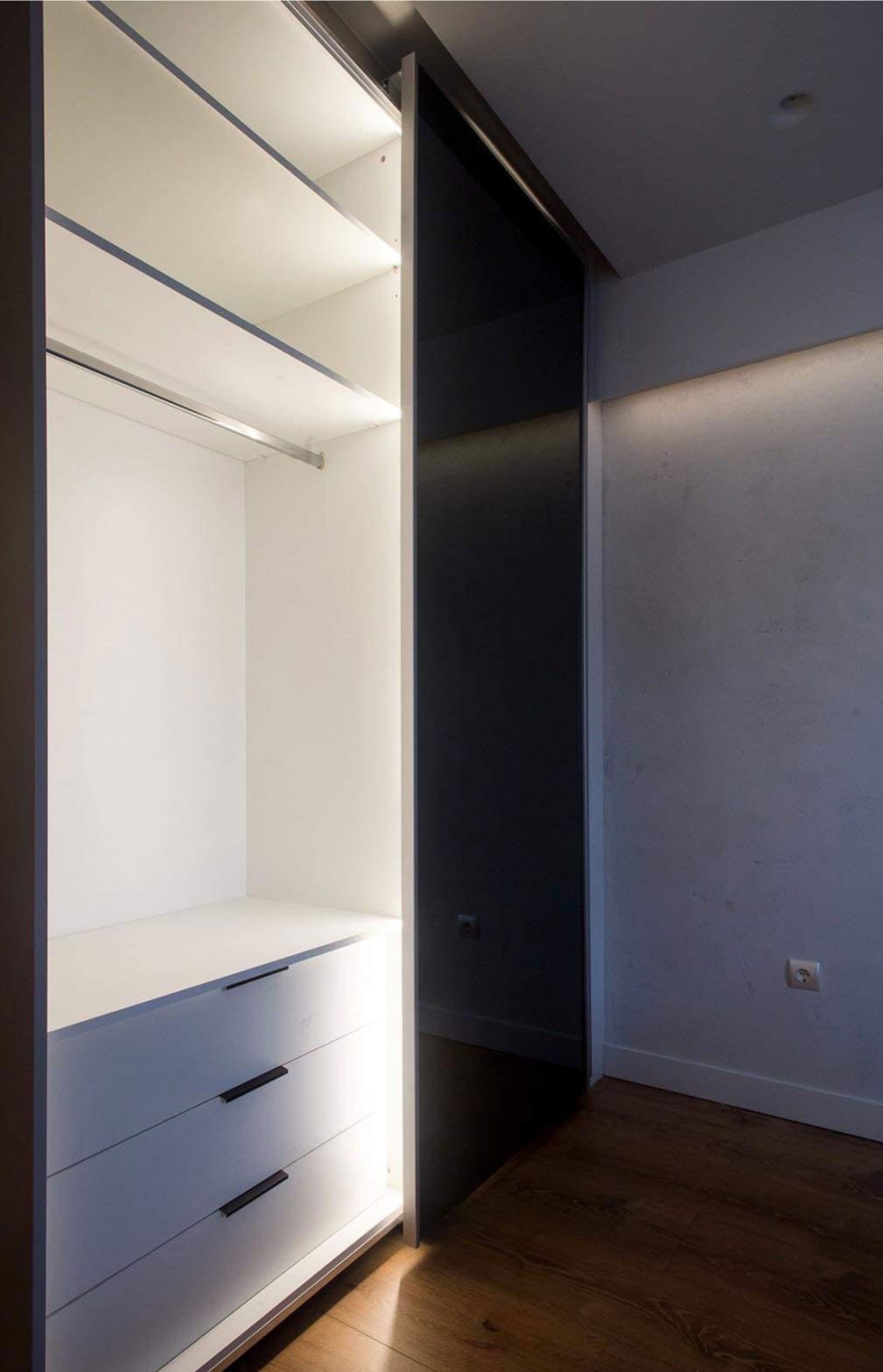 Built-in wardrobe with drawers and open shelving in a bedroom, Nea Filothei, Athens, Greece