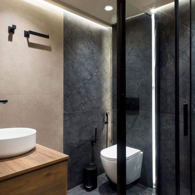 Bathroom view with vanity and walk-in shower enclosure with black frame, Nea Filothei, Athens, Greece