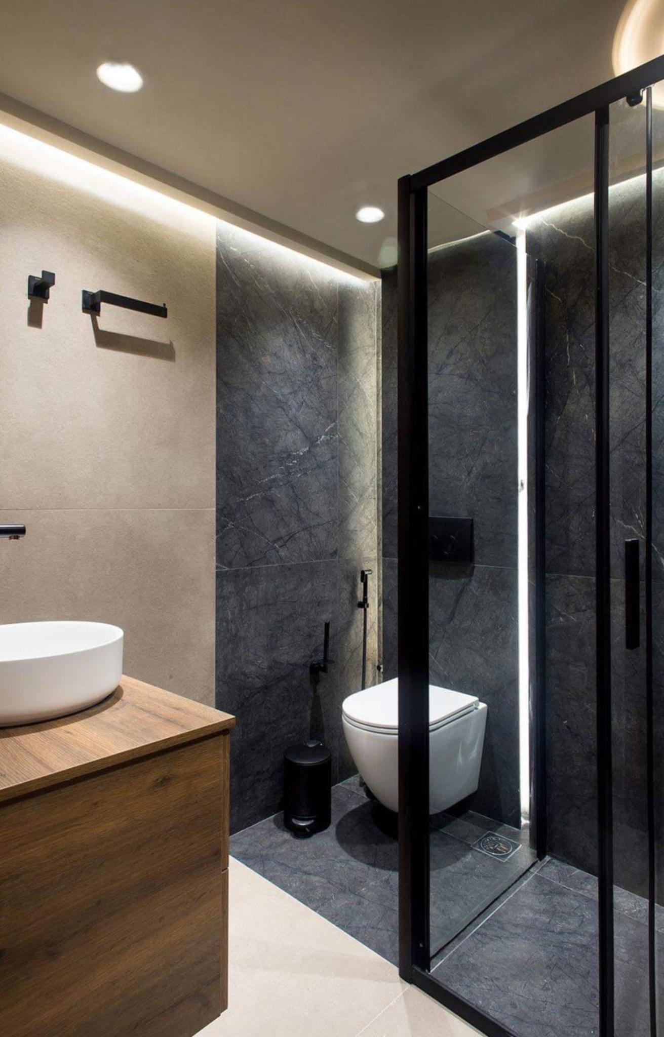 Bathroom view with vanity and walk-in shower enclosure with black frame, Nea Filothei, Athens, Greece