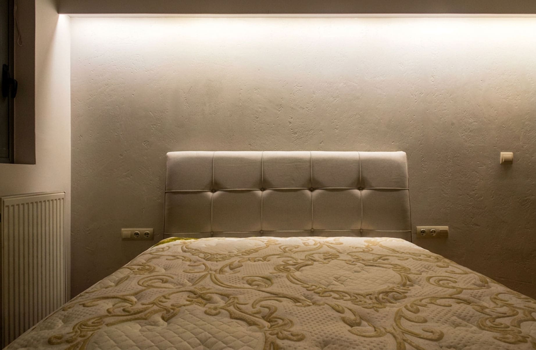 Bedroom view with upholstered headboard and soft ambient lighting, Nea Filothei, Athens, Greece