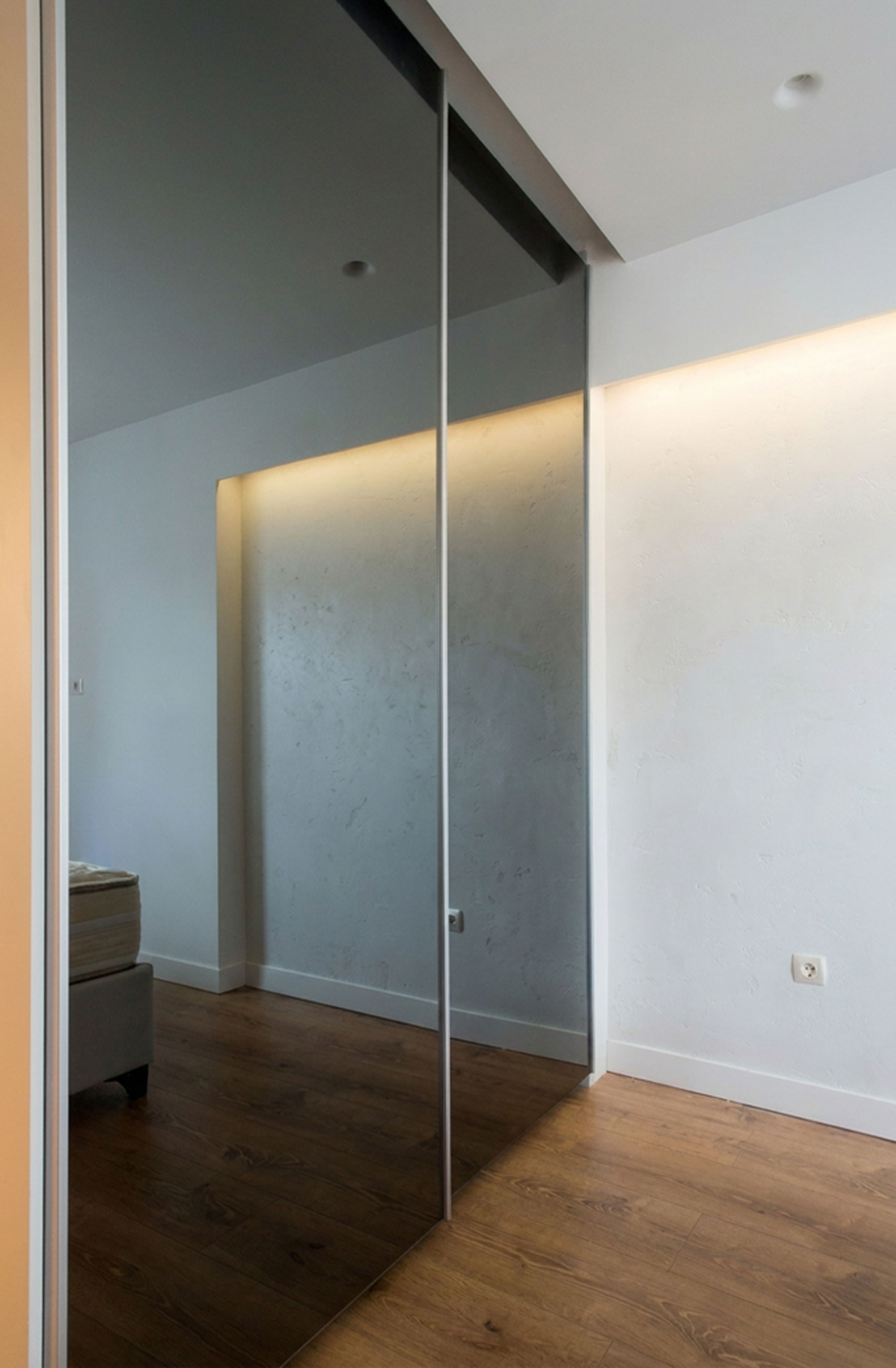 Bedroom with mirrored wardrobe doors and soft ambient lighting, Nea Filothei, Athens, Greece