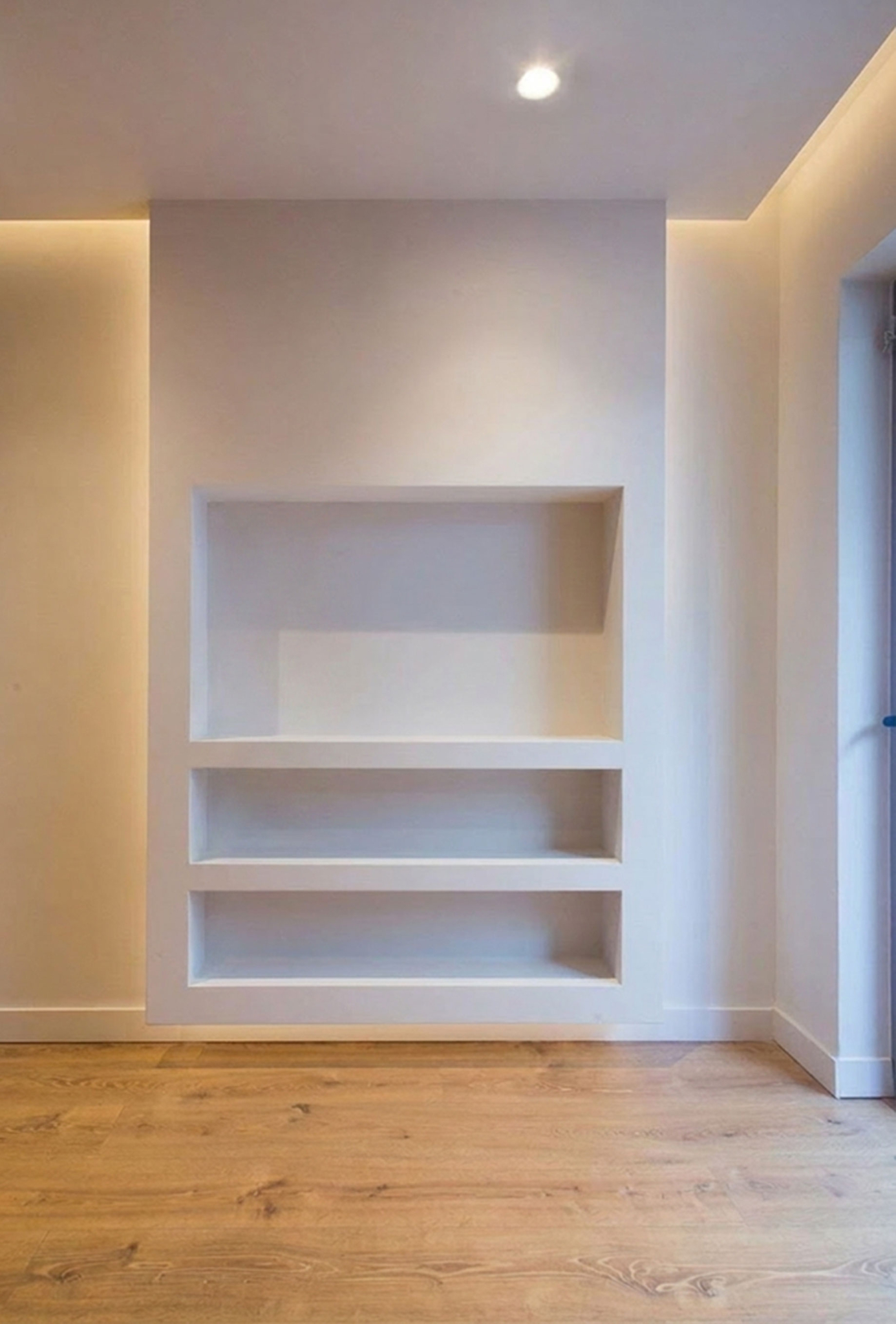 Interior niche with built-in shelving and wood flooring, Nea Filothei, Athens, Greece