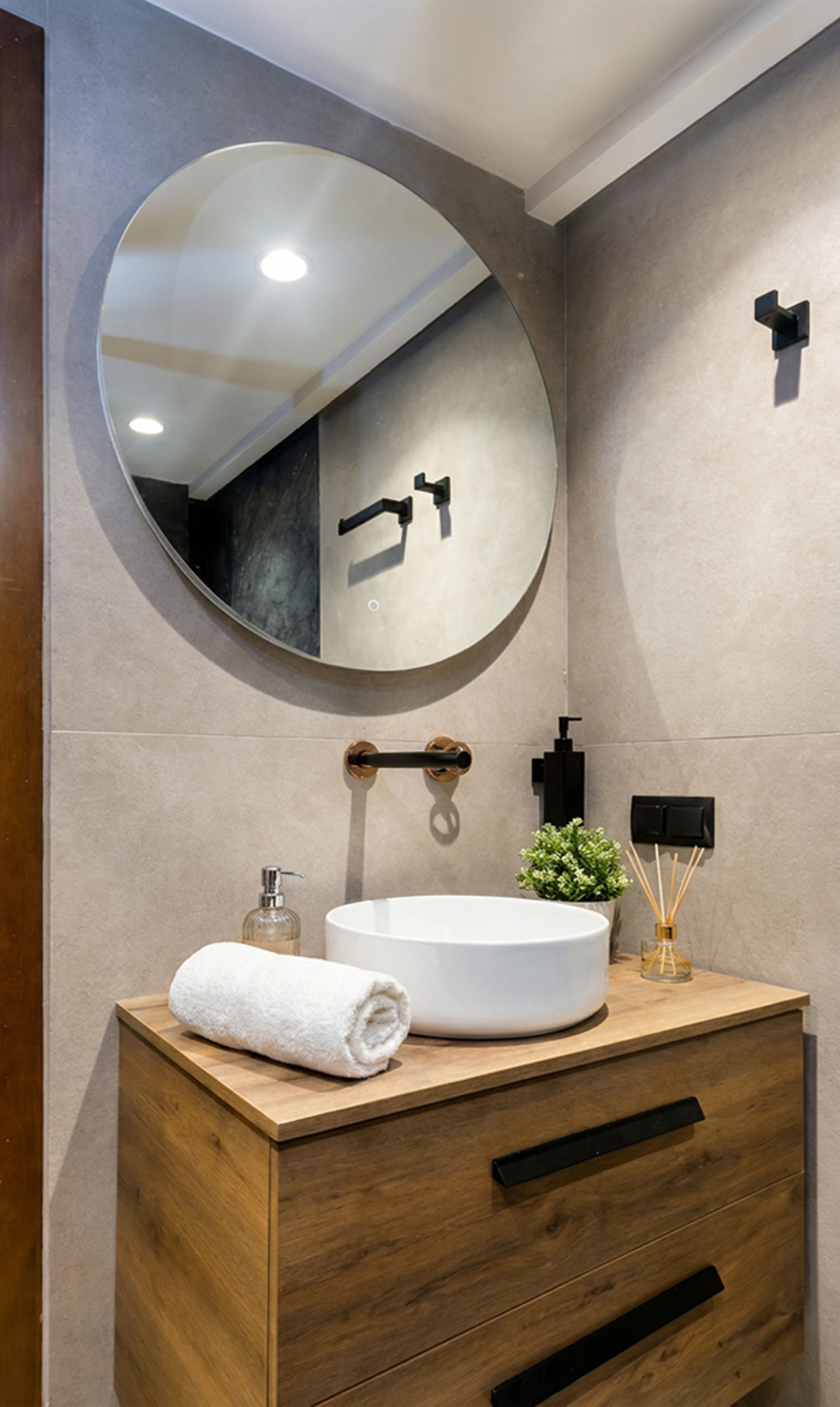 Bathroom vanity with round mirror, wood cabinet, and modern basin, Nea Filothei, Athens, Greece
