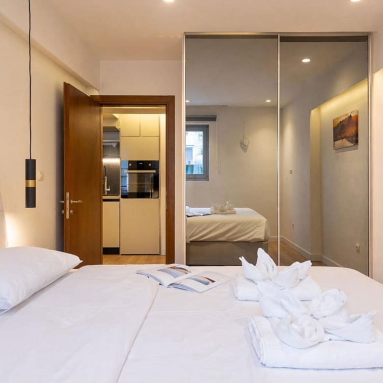 Bedroom with double bed, pendant lights, and hallway view, Nea Filothei, Athens, Greece