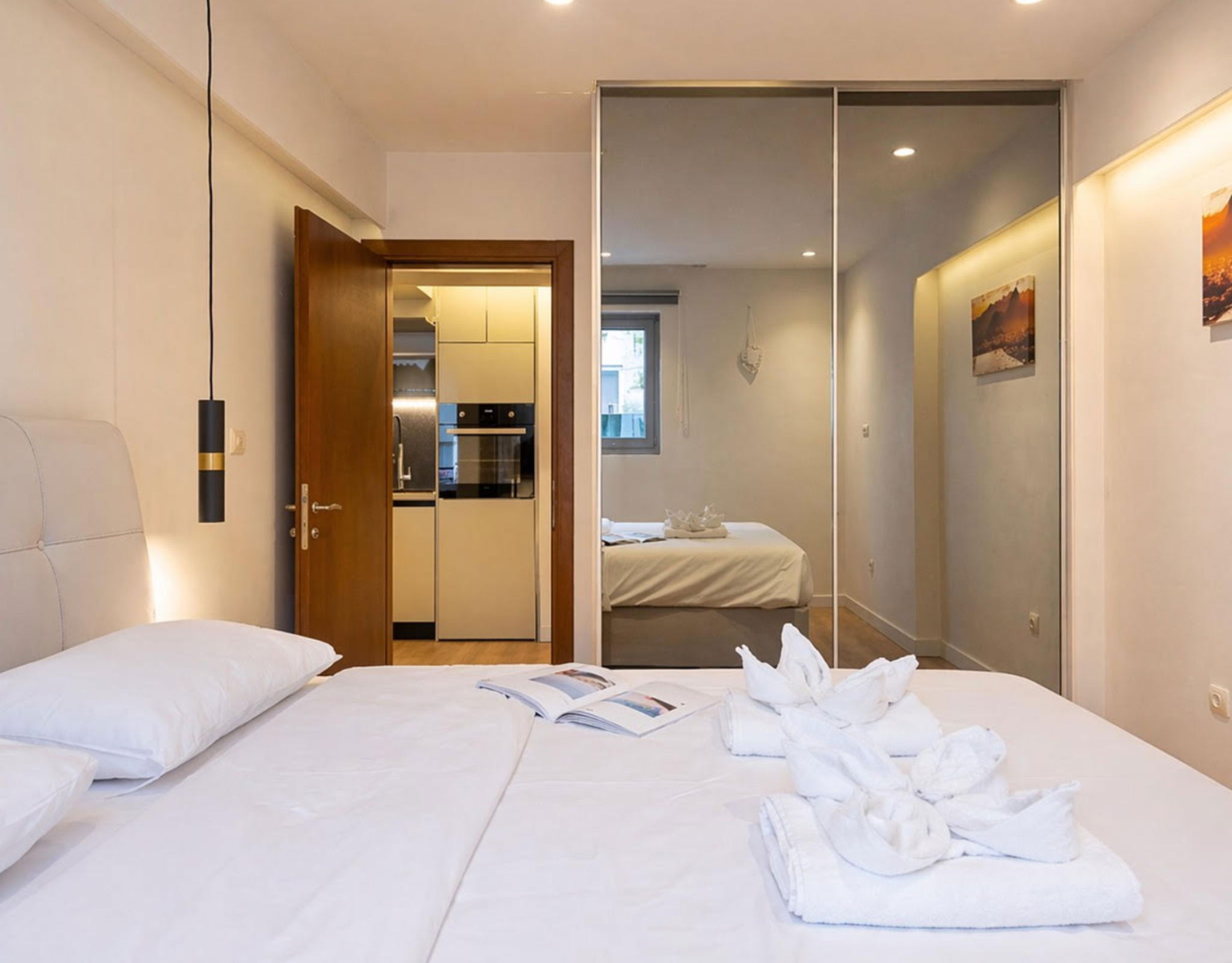 Bedroom with double bed, pendant lights, and hallway view, Nea Filothei, Athens, Greece