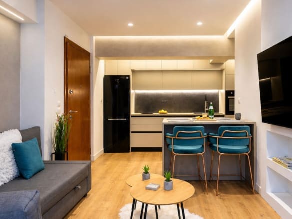 Modern kitchen with island, bar stools, and built-in appliances, Nea Filothei, Athens, Greece