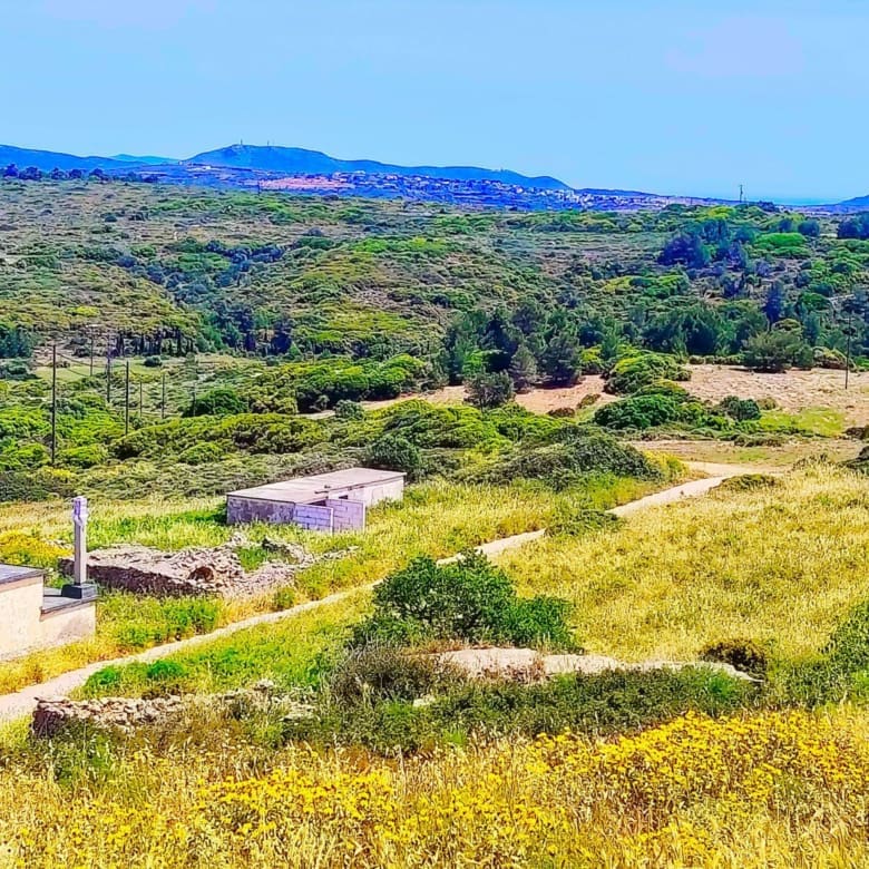 Panoramic hillside view with access road and open terrain, Kythira, Greece