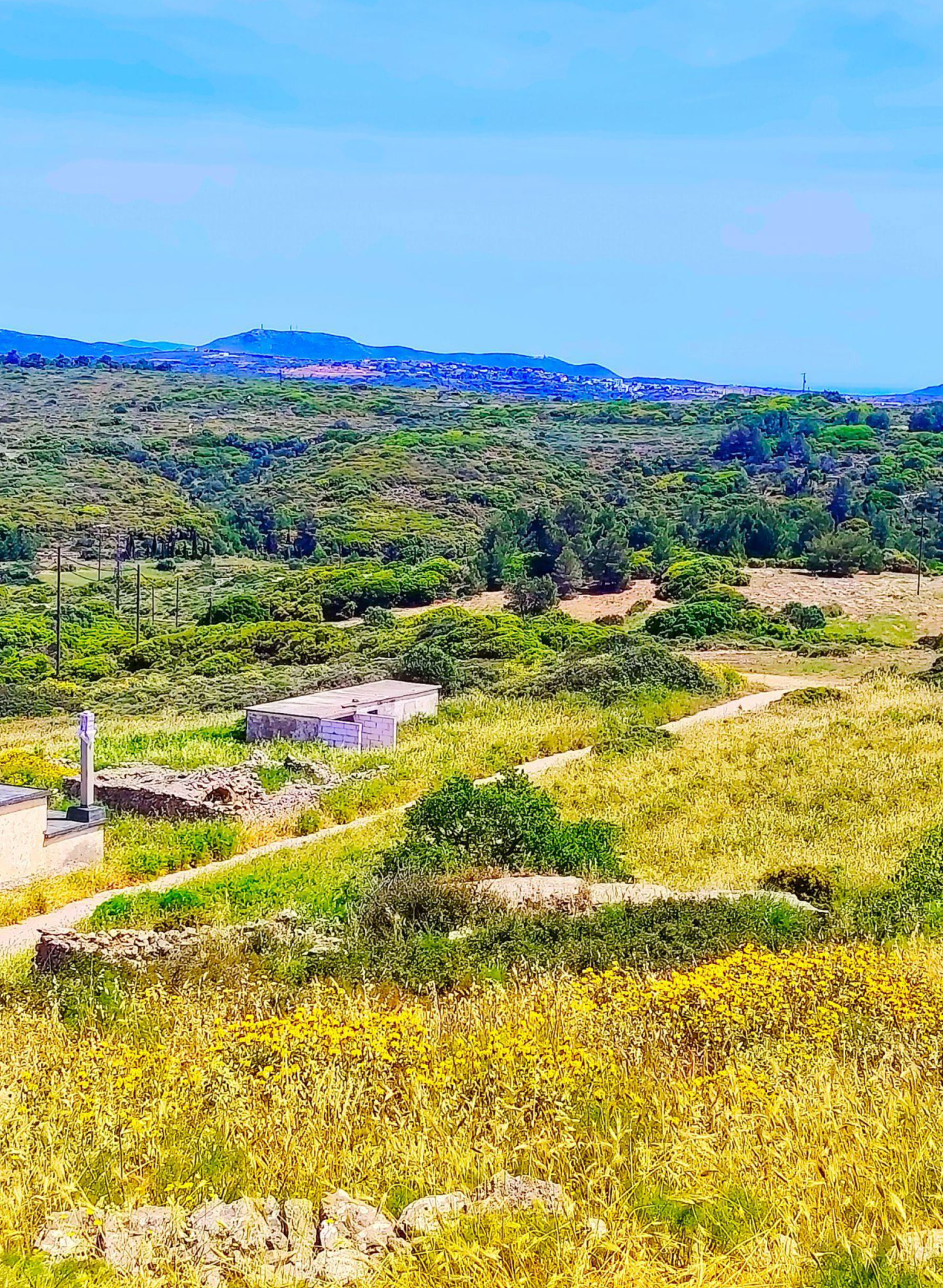 Panoramic hillside view with access road and open terrain, Kythira, Greece