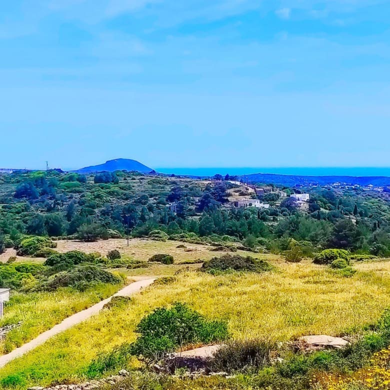 Open hillside landscape with sea horizon and distant hills, Kythira, Greece