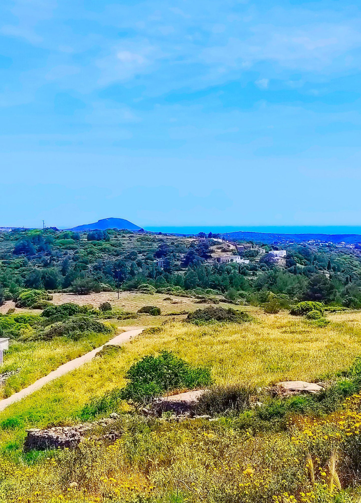 Open hillside landscape with sea horizon and distant hills, Kythira, Greece