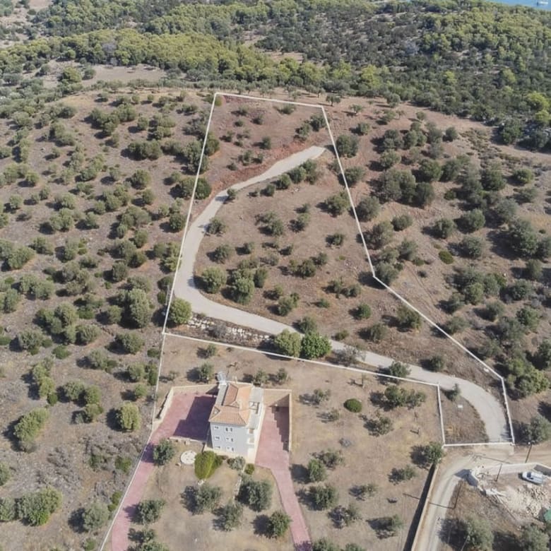 Aerial view of the plot with access road and olive trees, Ermioni, Greece