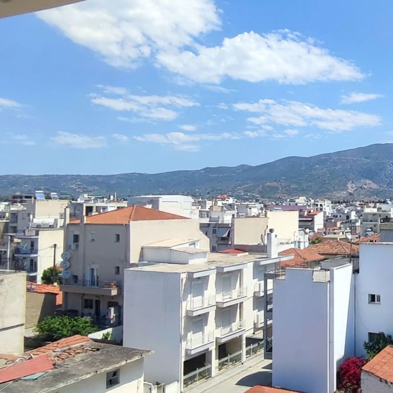 Panoramic city and mountain view from the balcony of a newly built duplex maisonette in Volos