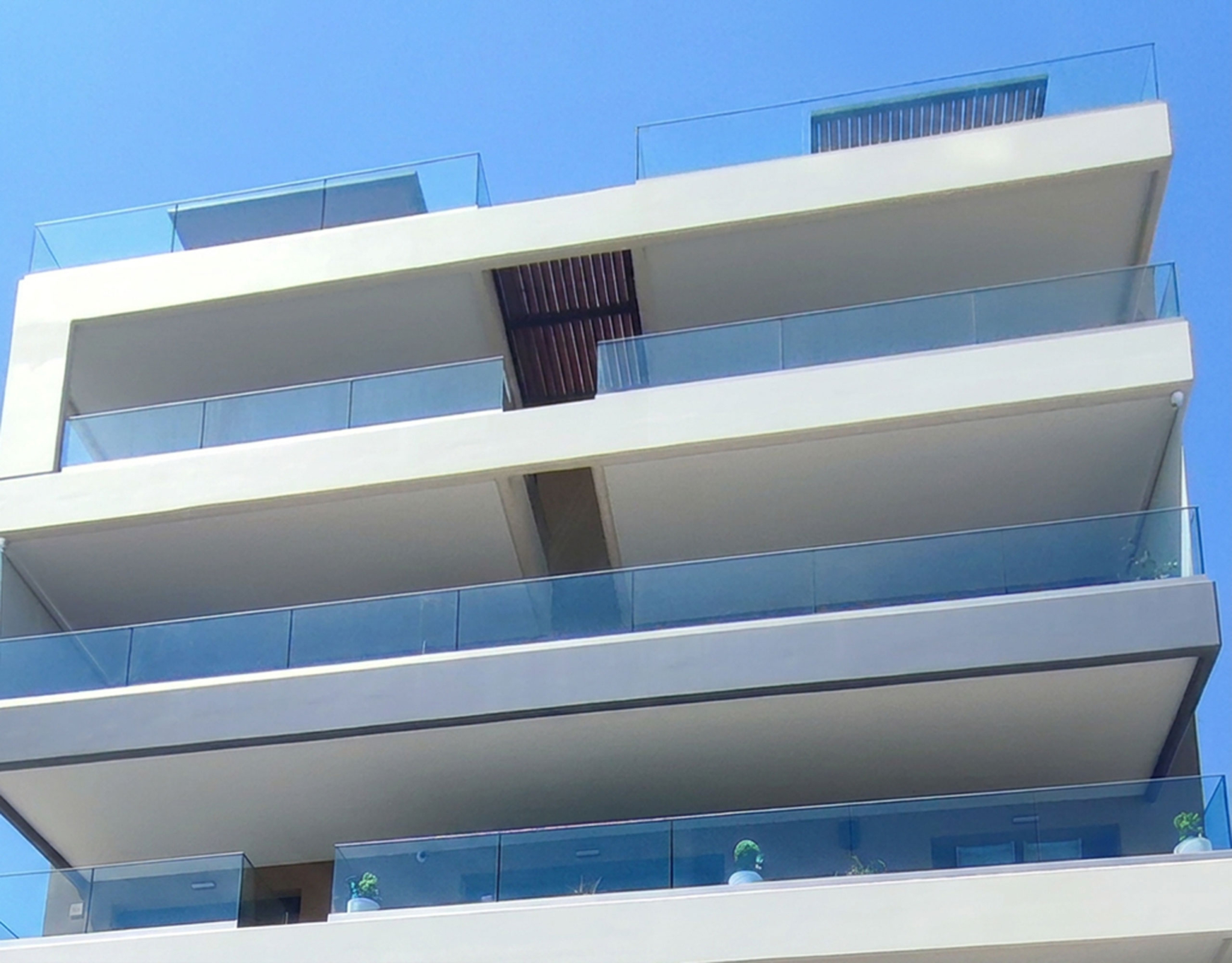 Modern Building with Glass Balconies Modern newly built residential building with glass balconies in Nea Ionia, Volos