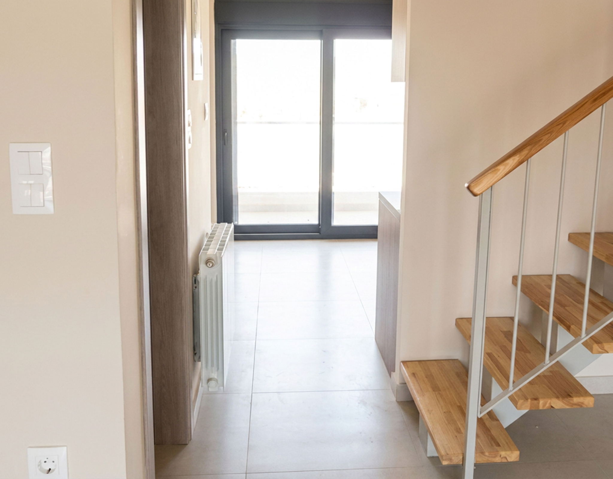 Internal Staircase & Hallway to the Balcony Internal staircase and hallway leading to the balcony in a newly built duplex maisonette in Nea Ionia, Volos