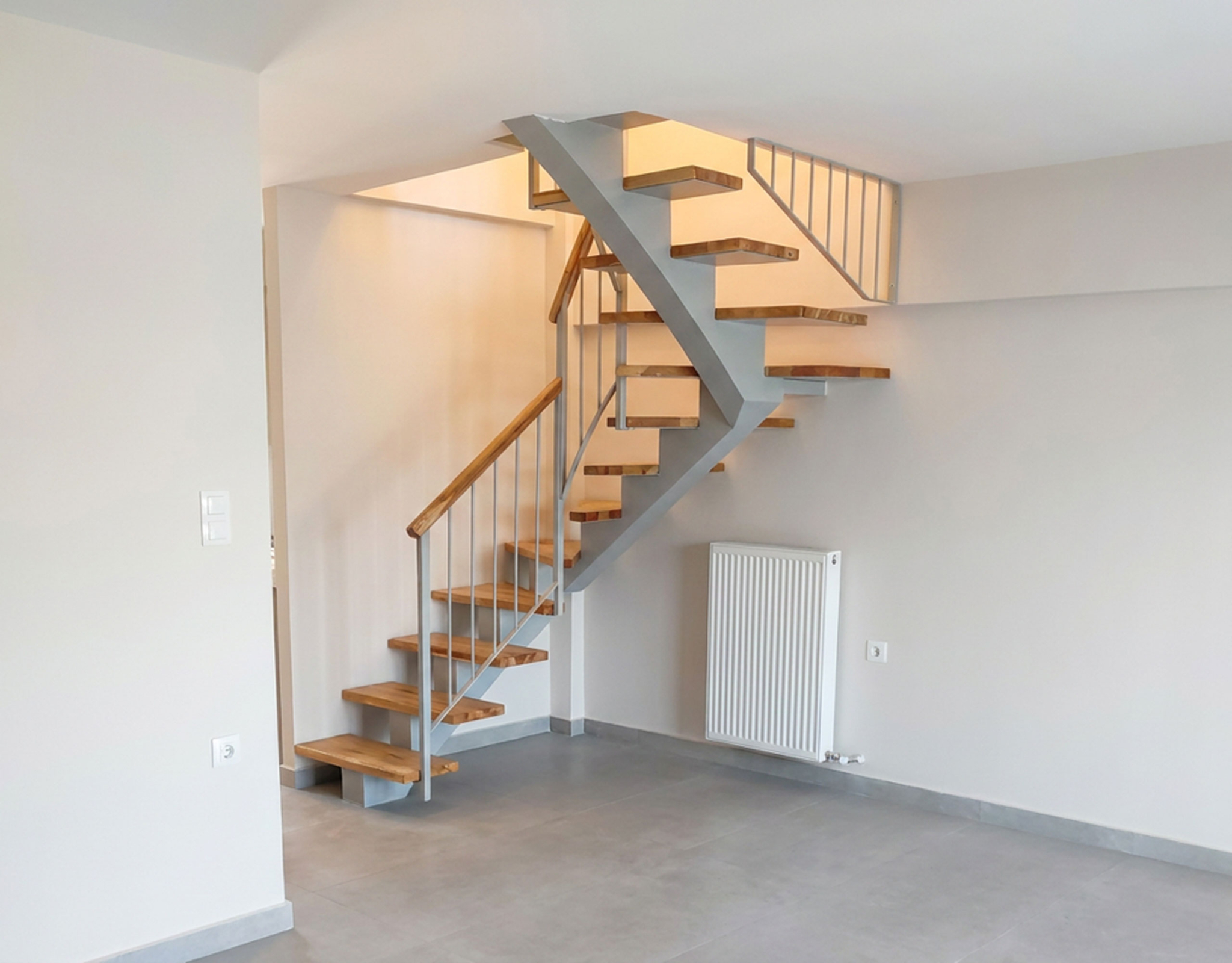 Internal Staircase Connecting Two Levels Internal wooden staircase connecting the two levels of a newly built duplex maisonette