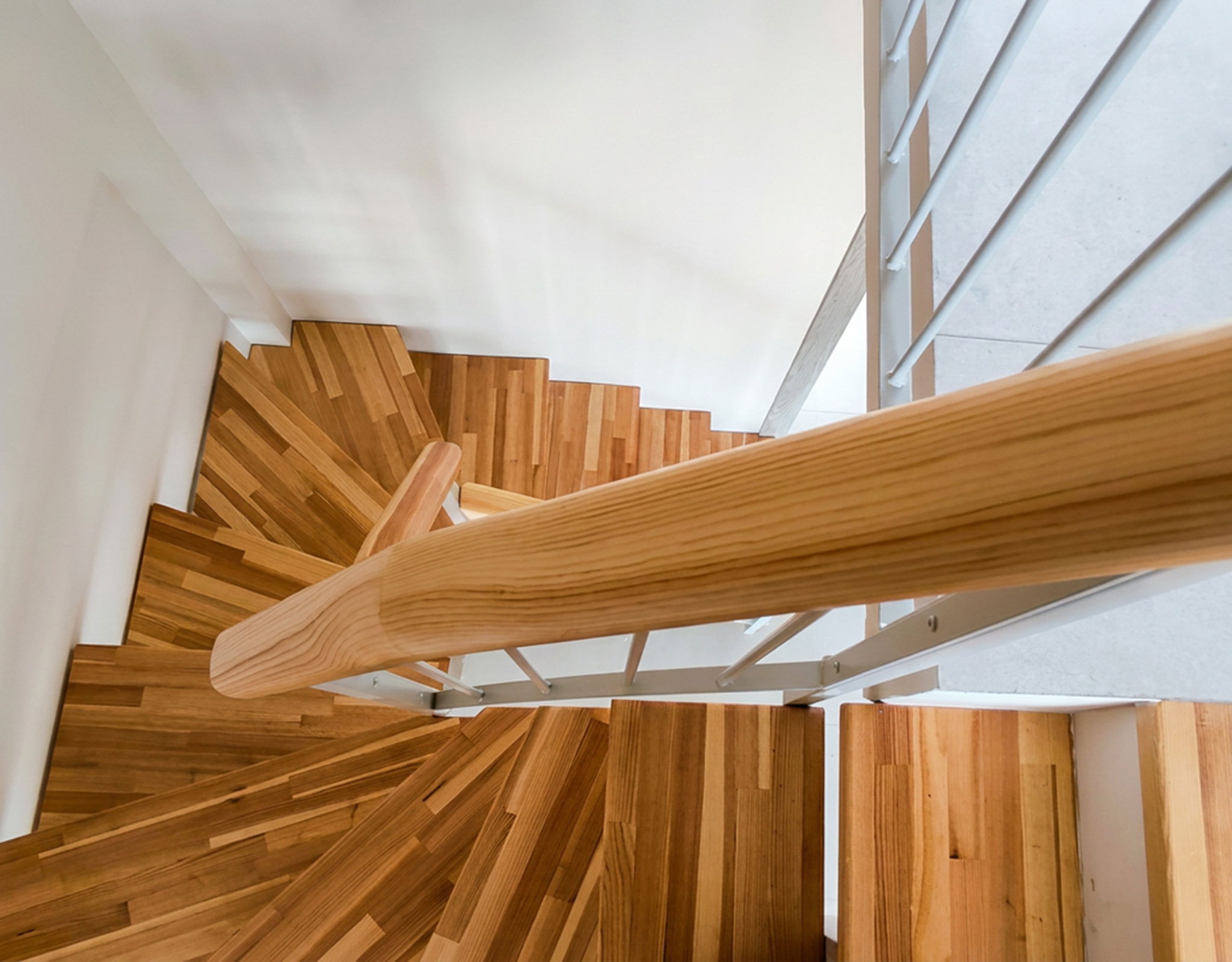 Internal Staircase Detail (Top View) Top view of the internal wooden staircase connecting the two levels of a duplex maisonette