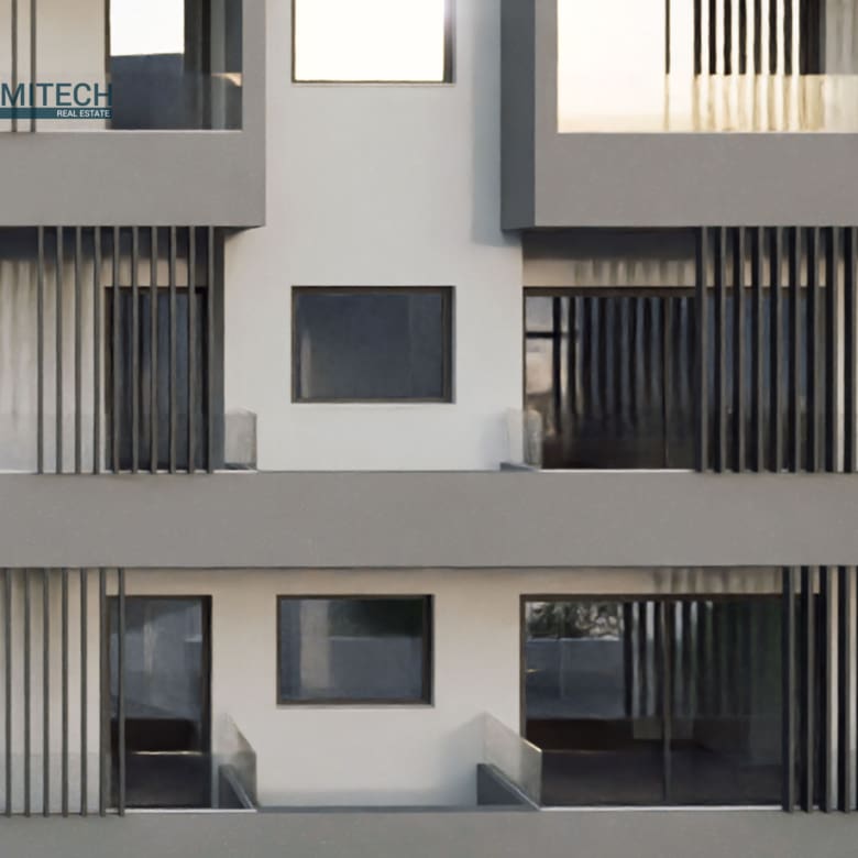 Close-up 3D rendering of the building façade showing balconies and vertical shading louvers in the new development in Ano Patissia, Athens.